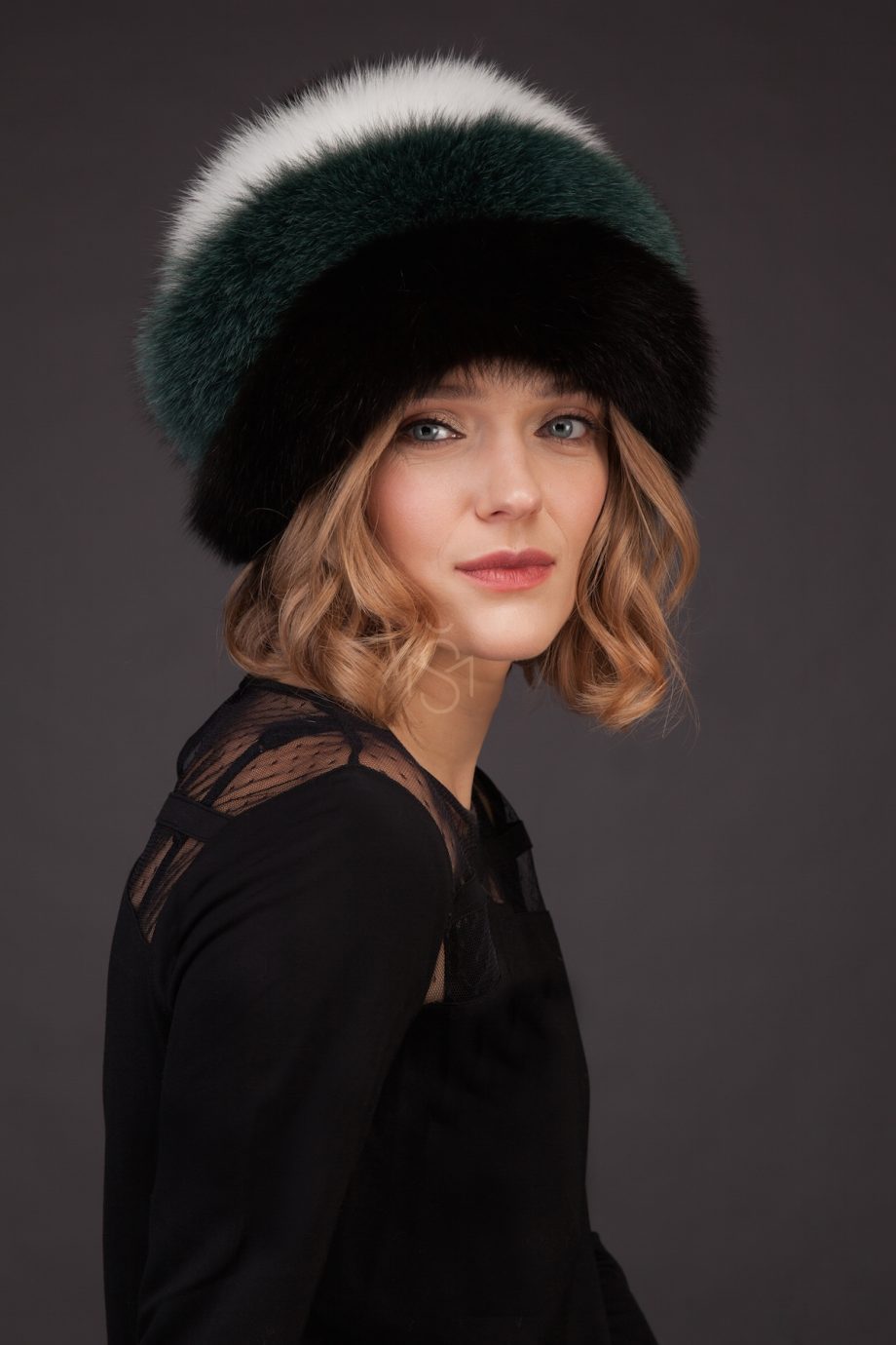 Contrast fox fur hat with pom-pom made by SILTA MADA fur studio in Vilnius