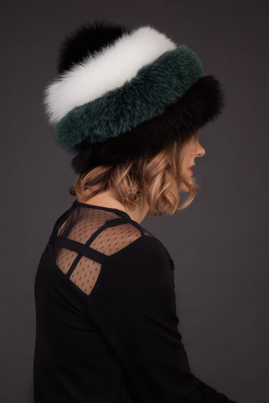 Contrast fox fur hat with pom-pom made by SILTA MADA fur studio in Vilnius