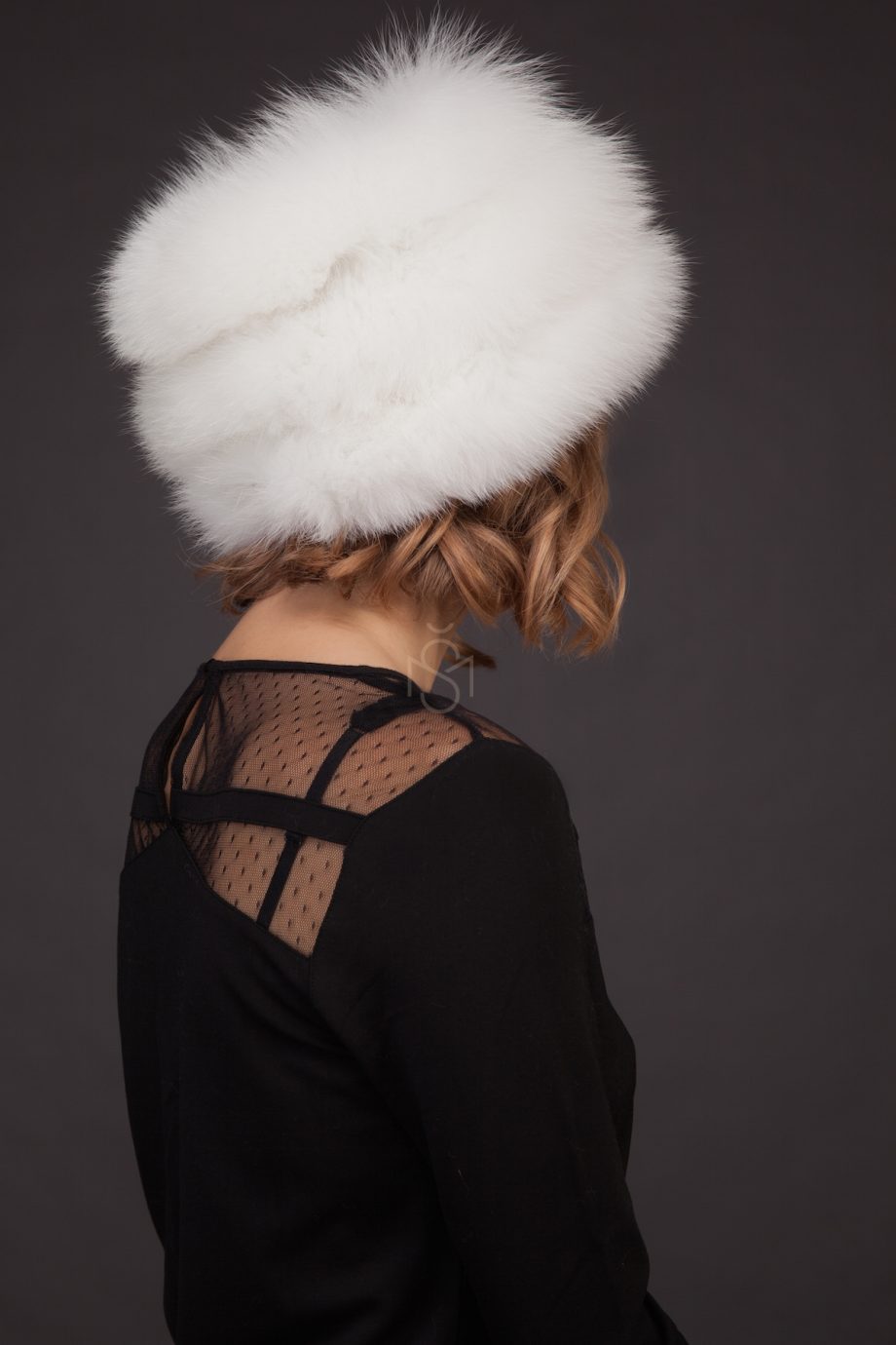 Fox fur hat with leather inserts made by SILTA MADA fur studio in Vilnius