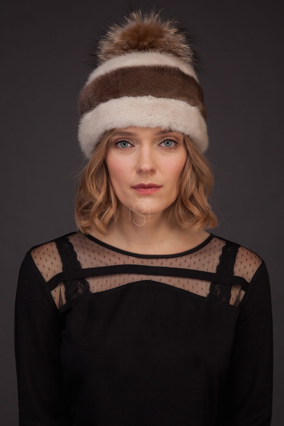 Combined mink fur hat with pom-pom and leather inserts made by SILTA MADA fur studio in Vilnius