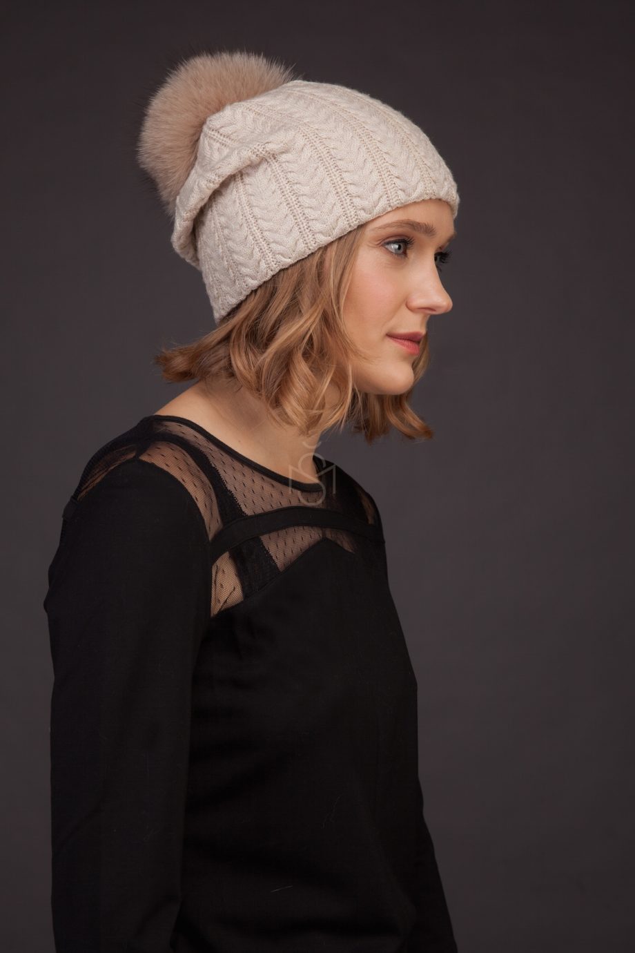Cashmere hat with fox fur pom-pom_light made by SILTA MADA fur studio in Vilnius