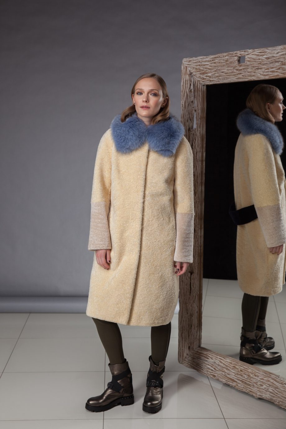 especially soft and light sheepskin coat decorated with fox fur made by Silta Mada fur studio in Vilnius.