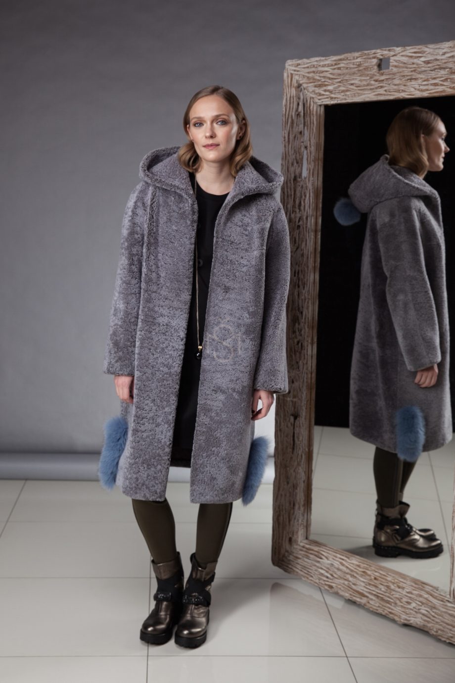 Exceptionally soft and light sheepskin coat with hood made by Silta Mada fur studio in Vilnius