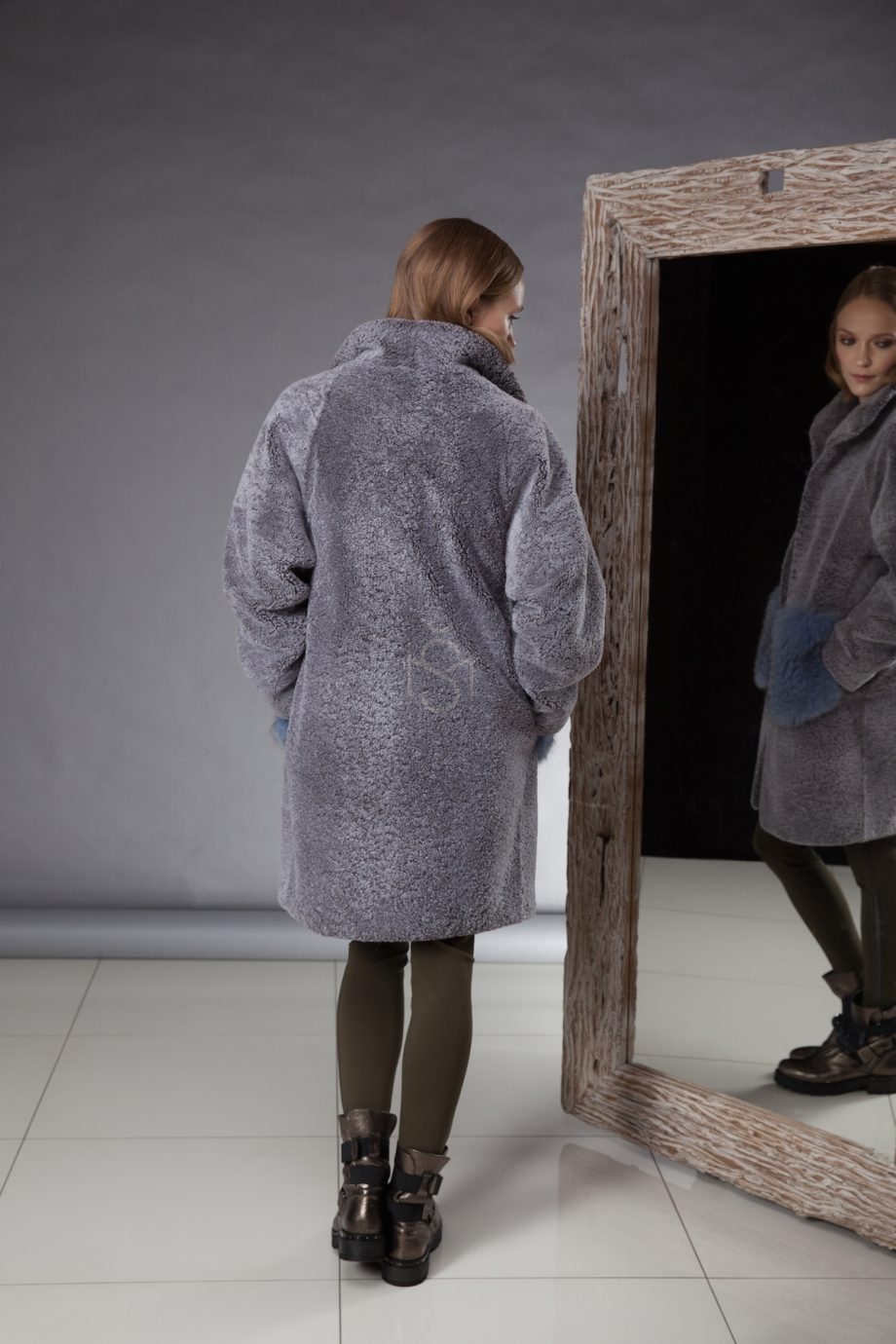 especially soft and light sheepskin coat decorated with fox fur made by Silta Mada fur studio in Vilnius