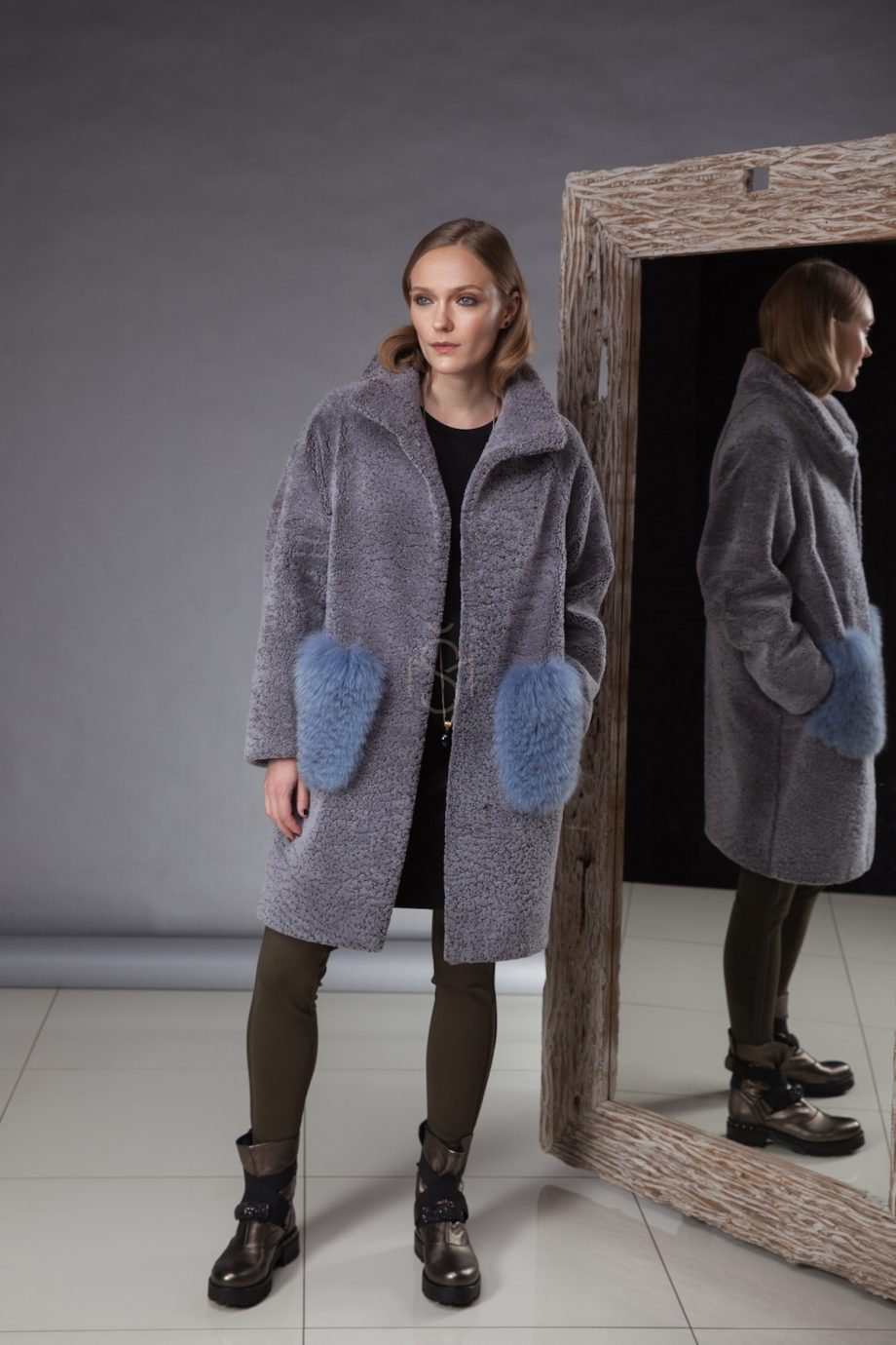 especially soft and light sheepskin coat decorated with fox fur made by Silta Mada fur studio in Vilnius